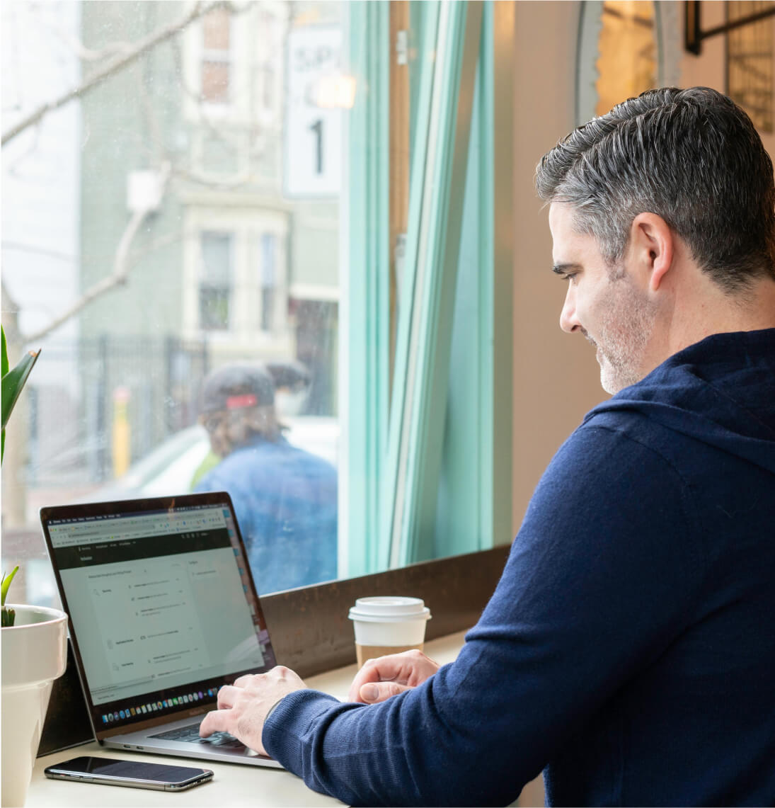 Person working on a laptop